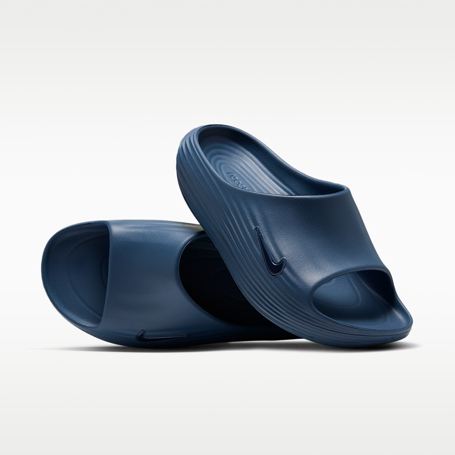 Nike ReactX Rejuven8 Men's Slides. Nike.com